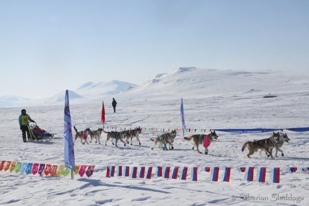 Our team crossing the finish line of day 3 in Yanrakynnot with the overall thrid fastest running time that day.