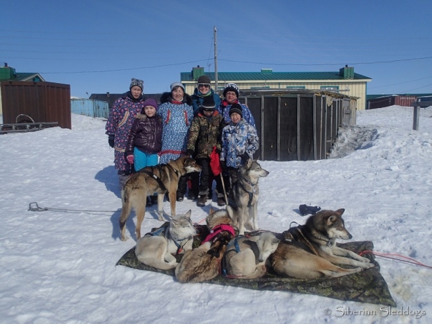 Our team posing with locals in Inchoun